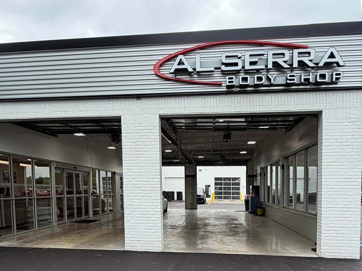Al Serra Body Shop service bay doors
